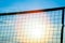 Beautiful mesh volleyball silhouette on sea background