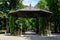 Beautiful metallic garden pavilion in Alexandru Buia Botanical Garden from Craiova in Dolj county, Romania, in a spring day with