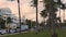 Beautiful Miami city landscape view. Beautiful hotel buildings along road full of cars.