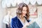 Beautiful middle-aged woman is counting banknotes in his wallet