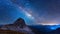 Beautiful milky way and mountain peak. Dark blue starry sky