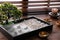 Beautiful miniature zen garden, candles and oil lamps on table