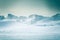 A beautiful, minimalist landscape of snowy Norwegian hills.