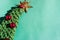 Beautiful minimalistic Christmas background. Handmade knitted Christmas tree with a Golden tinsel star on the top of the head and