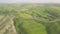 Beautiful and miraculous colors of green spring panorama landscape of Tuscany, Italy. Sunny morning near Pienza. Aerial