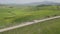 Beautiful and miraculous colors of green spring panorama landscape of Tuscany, Italy. Sunny morning near Pienza. Aerial