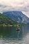 Beautiful misty and cloudy landscape with lake and mountains in summer. Natural colorful background. Traunsee lake in the Austrian