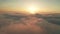 Beautiful misty dawn. Flying above the clouds, drone video