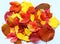 Beautiful mix of various bright autumn red and yellow leaves on white background. Fall texture.