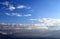 Beautiful mixed white and dark cloud formations on a blue sky