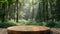 A beautiful mockup setting featuring a round wooden table in a sun-drenched forest, ideal for product and nature-themed