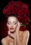 Beautiful model woman rose flower in hair beauty salon makeup