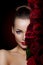 Beautiful model woman rose flower in hair beauty salon makeup