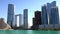 Beautiful modern city surrounded by water | Al Reem island landmarks such as Sun and Sky towers in Abu Dhabi city, UAE