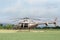 Beautiful modern helicopter on helipad in field