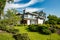 Beautiful modern house in cement, view from the garden.