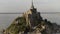 Beautiful Mont Saint Michel cathedral located on the island, Normandy, Northern France, Europe. Action. Panoramic view