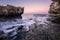 A beautiful moody golden seascape taken on a pink evening after sunset