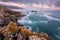 A beautiful moody golden seascape view taken on a stormy cloudy evening after sunset