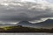 Beautiful moody landscape of Llynnau Mymbyr with Snowdon peak in distance in Winter