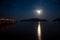 Beautiful moonlit path at night on the sea. Calm sea. Bright moon.