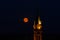 Beautiful moonrise over the church, Alsace