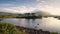 Beautiful morning lakeside landscape scenery of Twelve pines Island reflected in water surrounded by mountains at Connemara