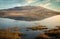 Beautiful morning landscape scenery with mountains reflected in Lake at Burren National Park in county Clare, Ireland