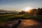 Beautiful morning scenery of czech mountains with forest, meadows and concrete bunker.