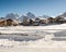 Beautiful morning with snowy farmhouses in the region of the Sesvenna mountain group