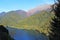 Beautiful mountain Lake Ritsa, Abkhazia, Georgia, surrounded by mixed mountain forests and subalpine meadows