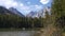 A beautiful mountain lake with the towering Tetons in the background.