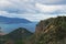 Beautiful mountain landscape. Huge colony of cactuses settled on the mountain slope. Tindari. Sicily