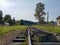 Beautiful mountain narrow-gauge railway road, rails in the mountains of the Carpathians passing through the forest in