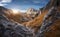 Beautiful mountain path, rocks and stones, orange trees at sunset