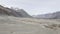 Beautiful Mountain Ranges, Valley, And Winding Road At Lamayuru, Moonland In Leh District Of Ladakh, India. - aerial drone shot