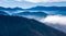 Beautiful mountain scenery on the background of clouds, layers of mountains on the horizon, Sierra Nevada Mountains, California,