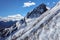 Beautiful mountain scenic landscape of the Main Caucasus ridge with snowy peaks at winter