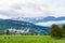 Beautiful mountain valley/field landscape with horses, trees and traditional austrian village in Austrian Alps. Austria, Salzkamme