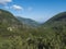 Beautiful mountain valley Smutna dolina with spruce tree forest, dwarf scrub pine and green mountain peaks. Western