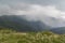 Beautiful mountain view with upcoming storm from the hills on the path to the Eho hut.