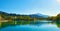 Beautiful Mountains and a lake in autumn.  Baggersee Badesee Rossau, Innsbruck, Austria