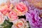 Beautiful multicolored artificial flowers background. flowers decor