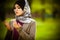 .Beautiful muslim woman wearing hijab praying on rosary / tespih