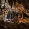 Beautiful mysterious karst cave, stalactites, stalagmites, calcareous outgrowths and scenery,