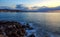 Beautiful mysterious marine landscape at sunset. Volcanic reef and ocean, Greek iseland Crete