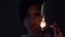 Beautiful mystical girl with a light bulb