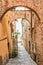 Beautiful narrow street in Montepulciano in Tuscany Italy