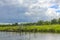 Beautiful natural landscape panorama jetty boat Oste river water Germany