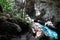 Beautiful natural landscape-view of a lake with clear blue water, located among the rocks inside a deep cave in the Dominican Repu